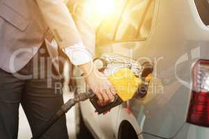 Man pumping petrol