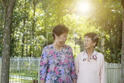 Asian elderly women morning exercise, walking at outdoor