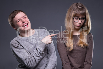 Sneering young man and woman
