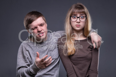 Young man and surprised girl