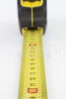 Yellow metal industrial tape measure