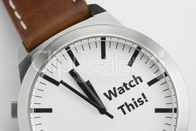 Watch with text Watch This.