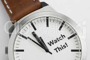 Watch with text Watch This.