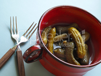 Gherkins in a red bowl