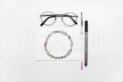 Composition on a white background. Hand drawn floral wreath frame.