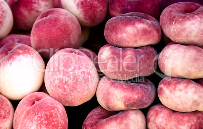 Tasty fruits - ripe peaches.