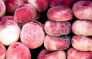 Tasty fruits - ripe peaches.