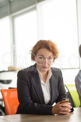 Angry business woman in office