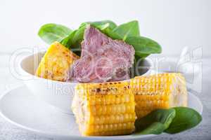 Beef and grilled corn