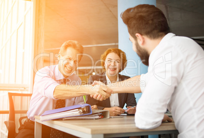 Happy employees in office