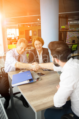 Happy employees in office