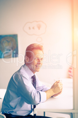 Businessman having coffee break