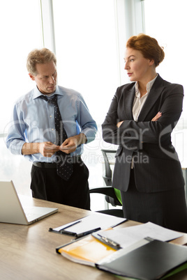 Two angry bosses man and woman in office