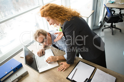 Angry boss screaming at workers