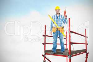 Composite image of portrait of smiling repairman with tools 3d