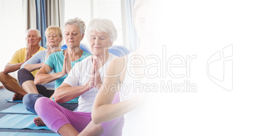 Front view of seniors relaxing with fitness instructor
