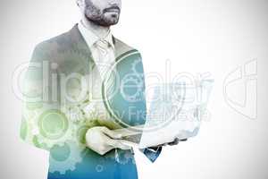 Composite image of midsection of businessman holding laptop 3d