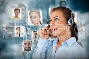 Composite image of call center agent looking upwards while talking