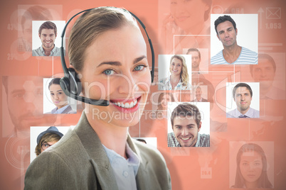 Composite image of smiling businesswoman with headset using computers