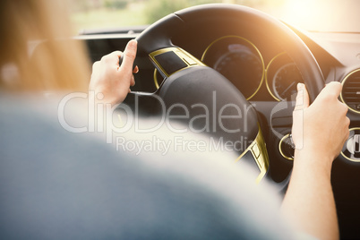 Cropped image of woman driving