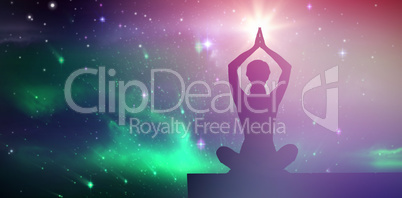 Composite image of calm blonde meditating in lotus pose with arms raised