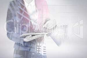 Composite image of midsection of businesswoman using digital tablet 3d