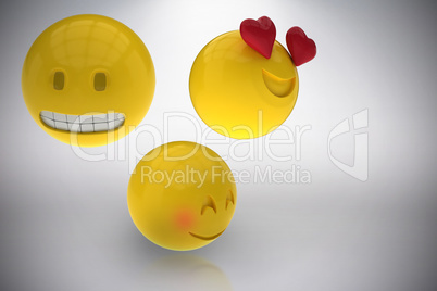 Composite image of three dimensional image of emoticons reactions 3d
