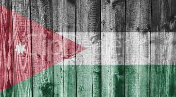 Fahne von Jordanien auf verwittertem Holz