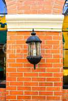 Classic lamp on the brick wall