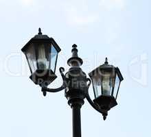 Old city lamp isolated on sky