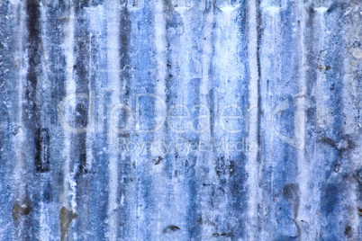 Old corrugated iron fence for background.