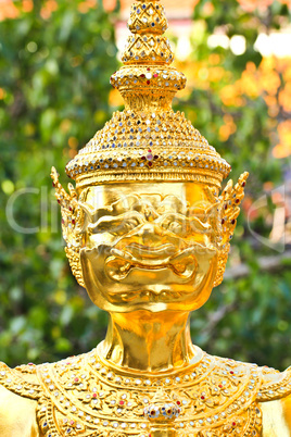 Golden statue in Wat Phra Keao in the Grand Palace in Bangkok Th