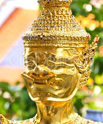 Golden statue in Wat Phra Keao in the Grand Palace in Bangkok Th