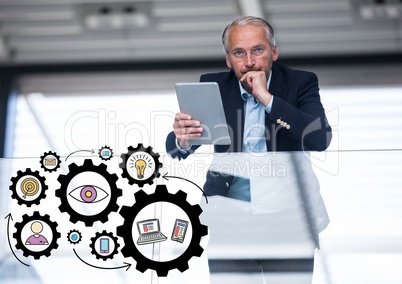 Business man on balcony with black gear graphics