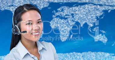 Travel agent with headset against map with clouds and blue background