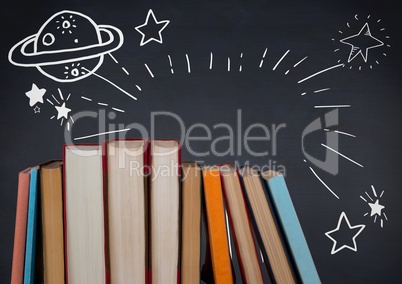 Standing books with white space doodles against navy chalkboard