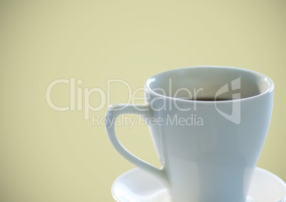Coffee cup against olive background
