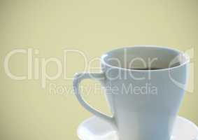 Coffee cup against olive background