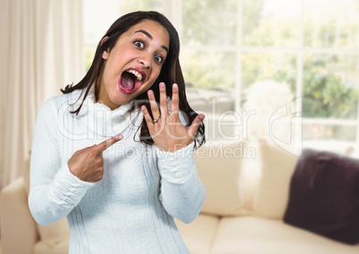 Engaged Woman with ring excited by window