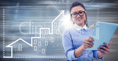 Woman with tablet against motion blur with white house graphic