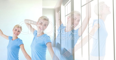 Woman exercising relaxing yoga by window