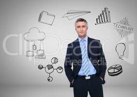 Businessman with technology and business graphics drawings