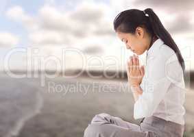 Woman Praying yoga Meditating by sea