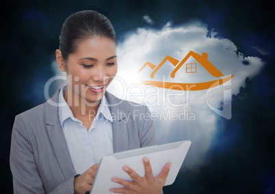 Business woman on tablet in front of cloud with orange house graphic