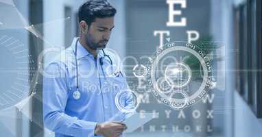 Doctor looking at his tablet surounded with futuristic interface