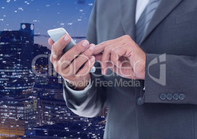 Businessman touching phone against Night city with connectors