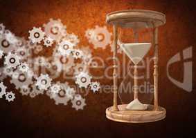 Egg Timer with sand and cog wheel settings icons against brown background