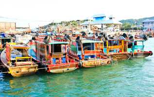 Fisher boat in koh Sichang harbor , Chonburi ,Thailand.