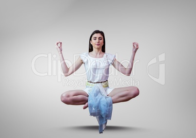 Woman Meditating floating against grey background