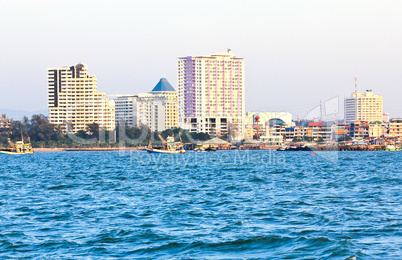 The view from the sea of the buildings and skyscrapers in Srirac